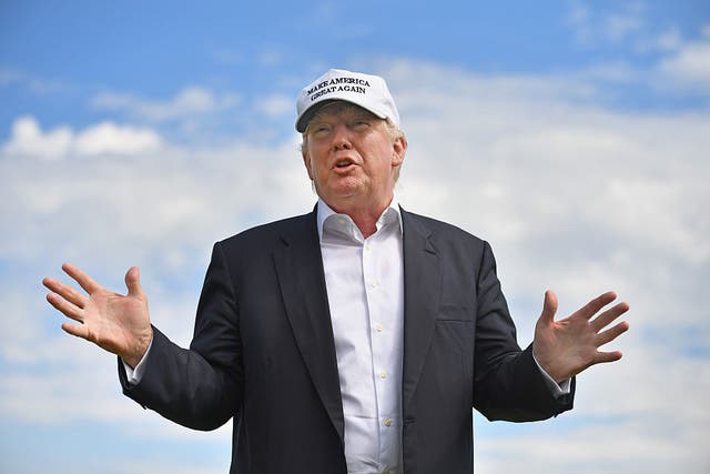 <p>Donald Trump on a visit to his Aberdeen course in 2016</p>