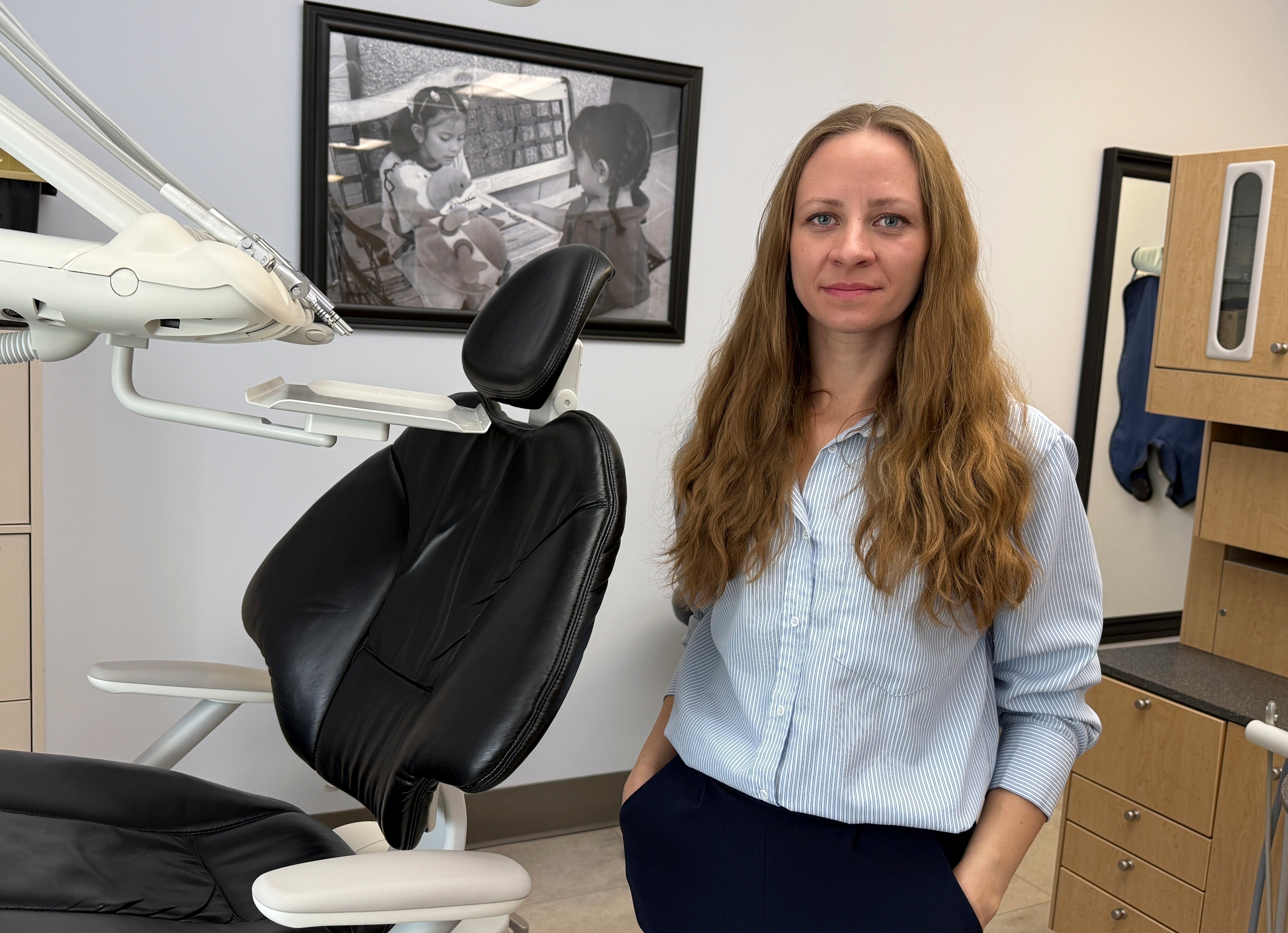Sasha Harvey, executive director of Salt Lake Donated Dental Services, stands in her clinic that provides free or heavily discounted dental treatment to low-income patients, Monday, May 5, 2025, in Salt Lake City, Utah. (AP Photo/Hannah Schoenbaum)