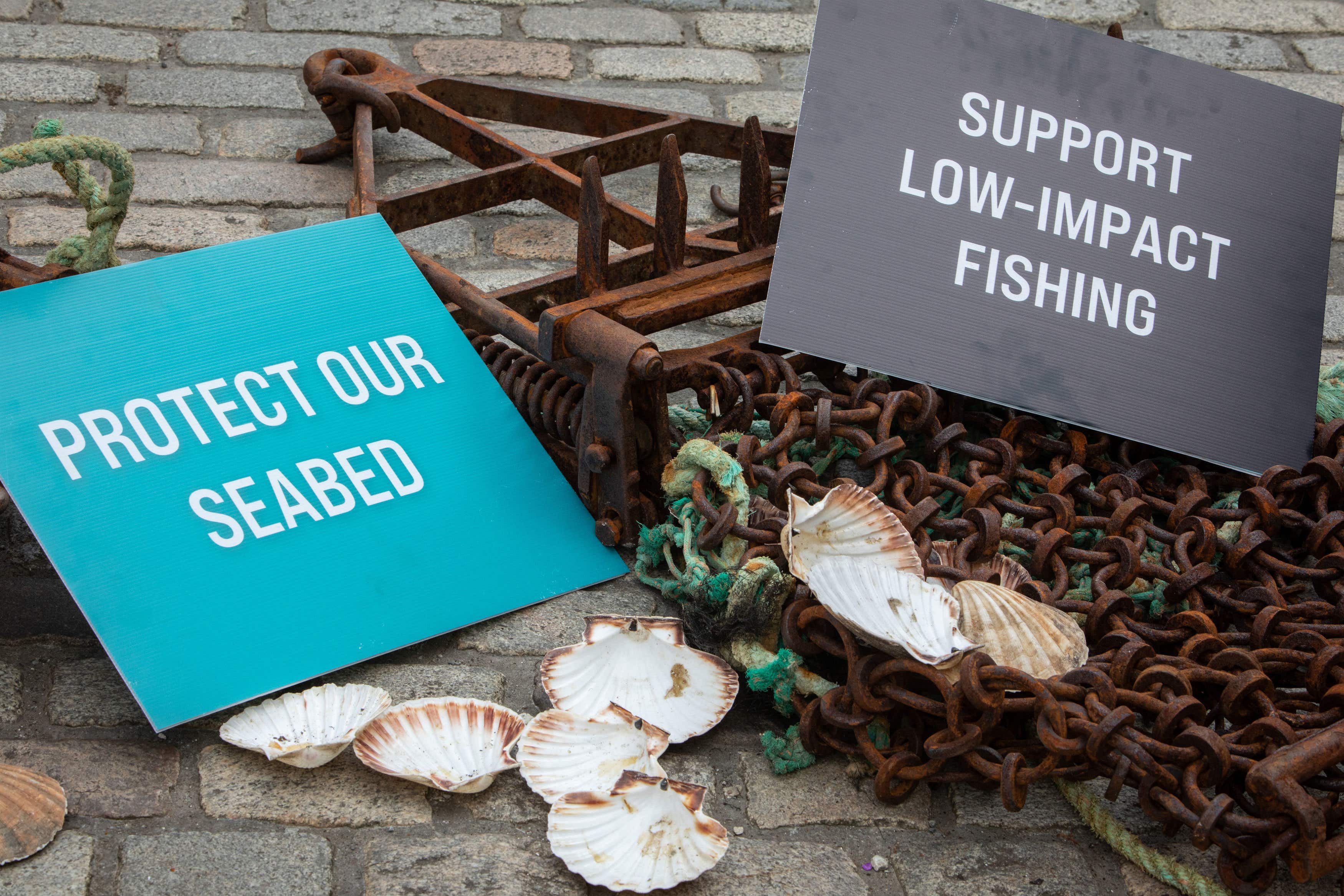 Members of the Open Seas coalition accused the Scottish Government of ‘broken promises’ (Jeremy Sutton-Hibbert/Open Seas/PA)