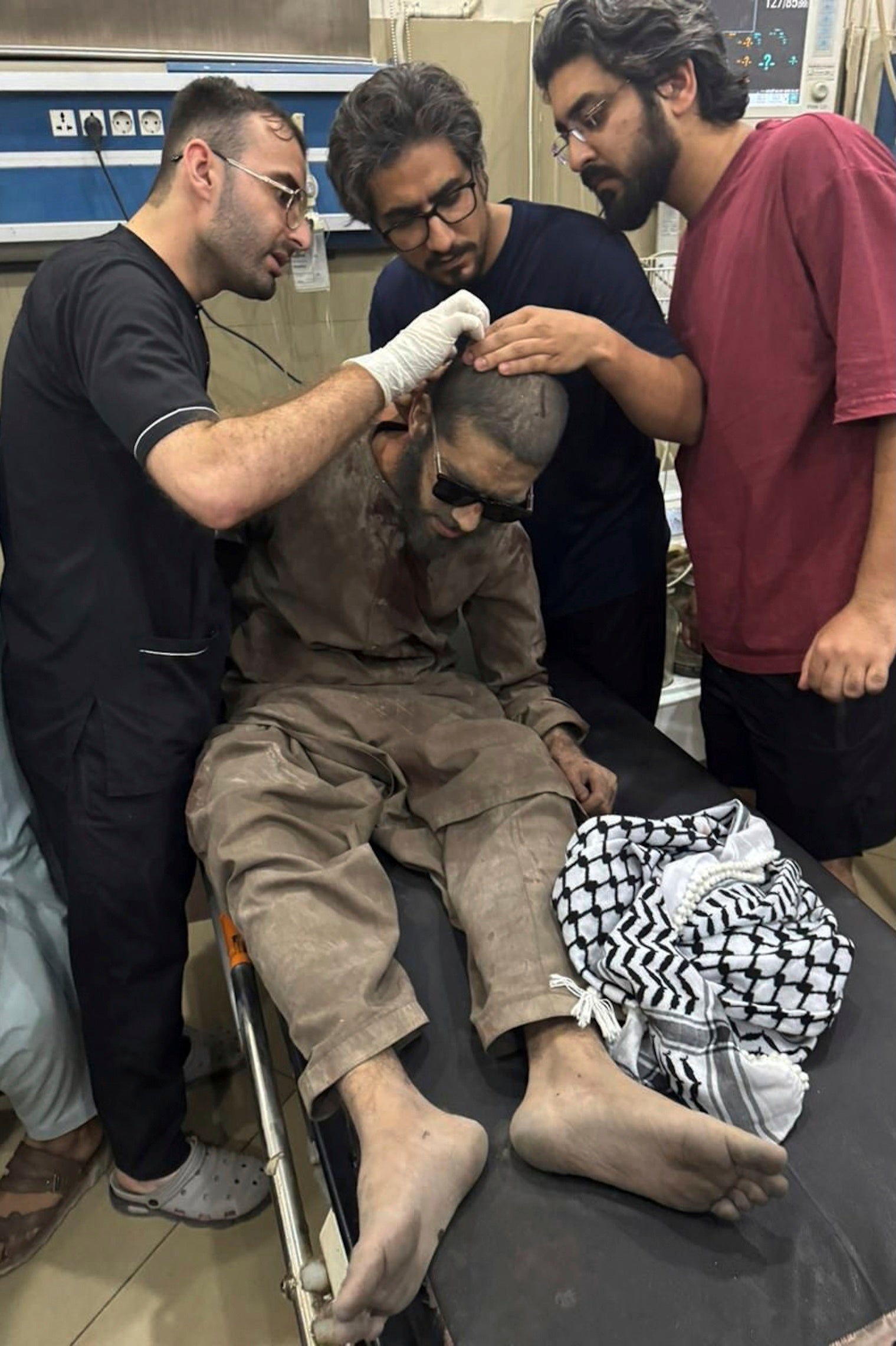 a person injured in a suspected Indian missile attack, receives treatment at a hospital in Bahawalpur, Pakistan