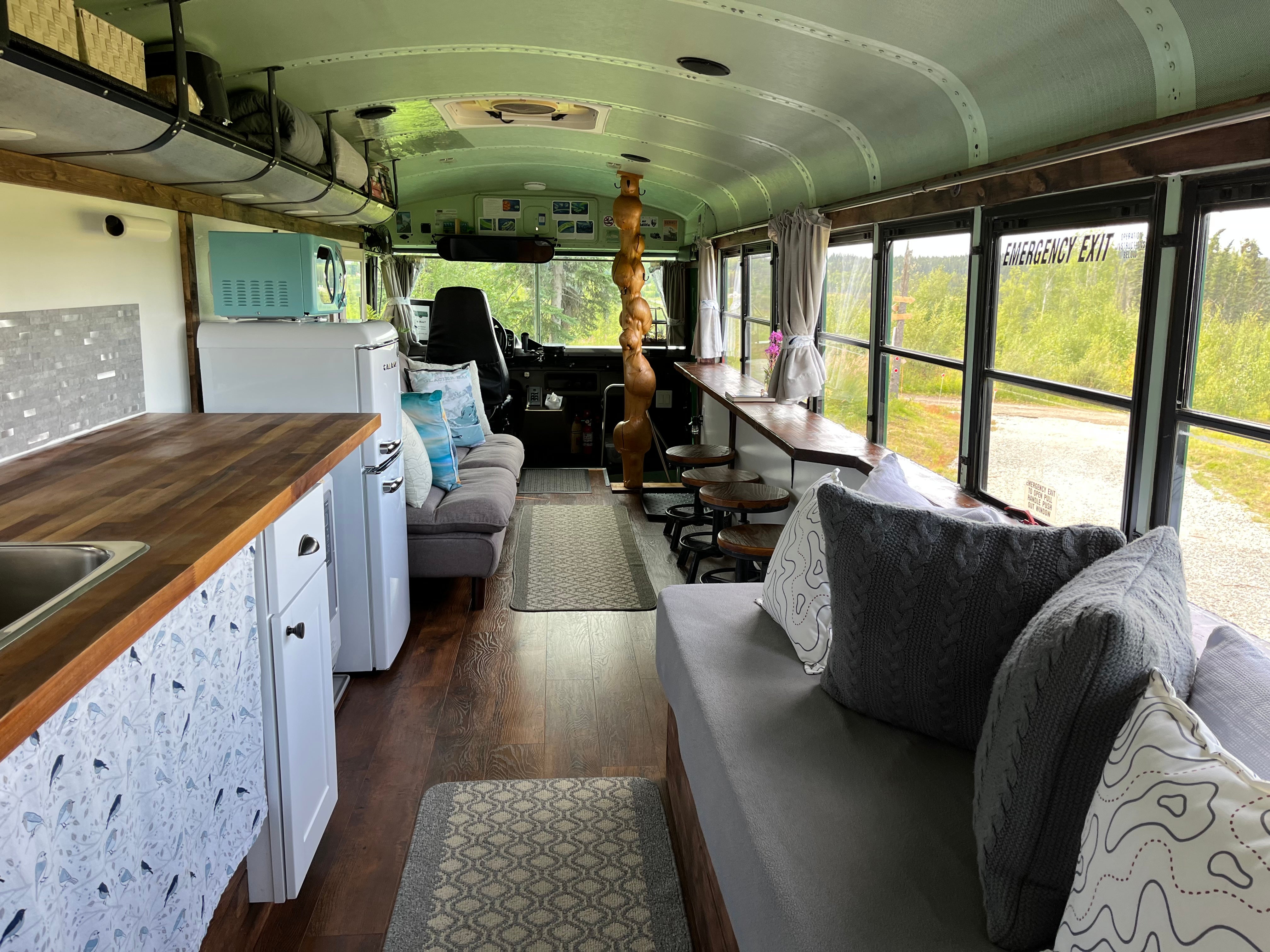 The bus sleeps five and comes with a farmhouse-style kitchen