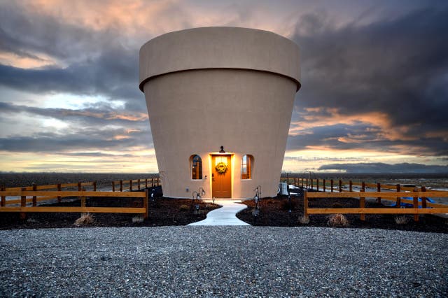 <p>The 'Flowerpot home' in Idaho, Elevation 40 Zion cabin in Utah and a refurbished Chinook in Florida make Airbnb's 'most wishlisted' ranking for 2025</p>