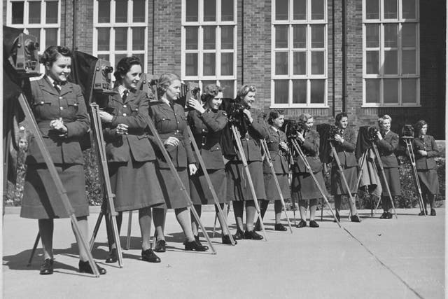 A collection of more than 150 rare photographs of behind-the-scenes wartime film-making, has been released to mark the 80th anniversary of VE Day (Historic England/PA)