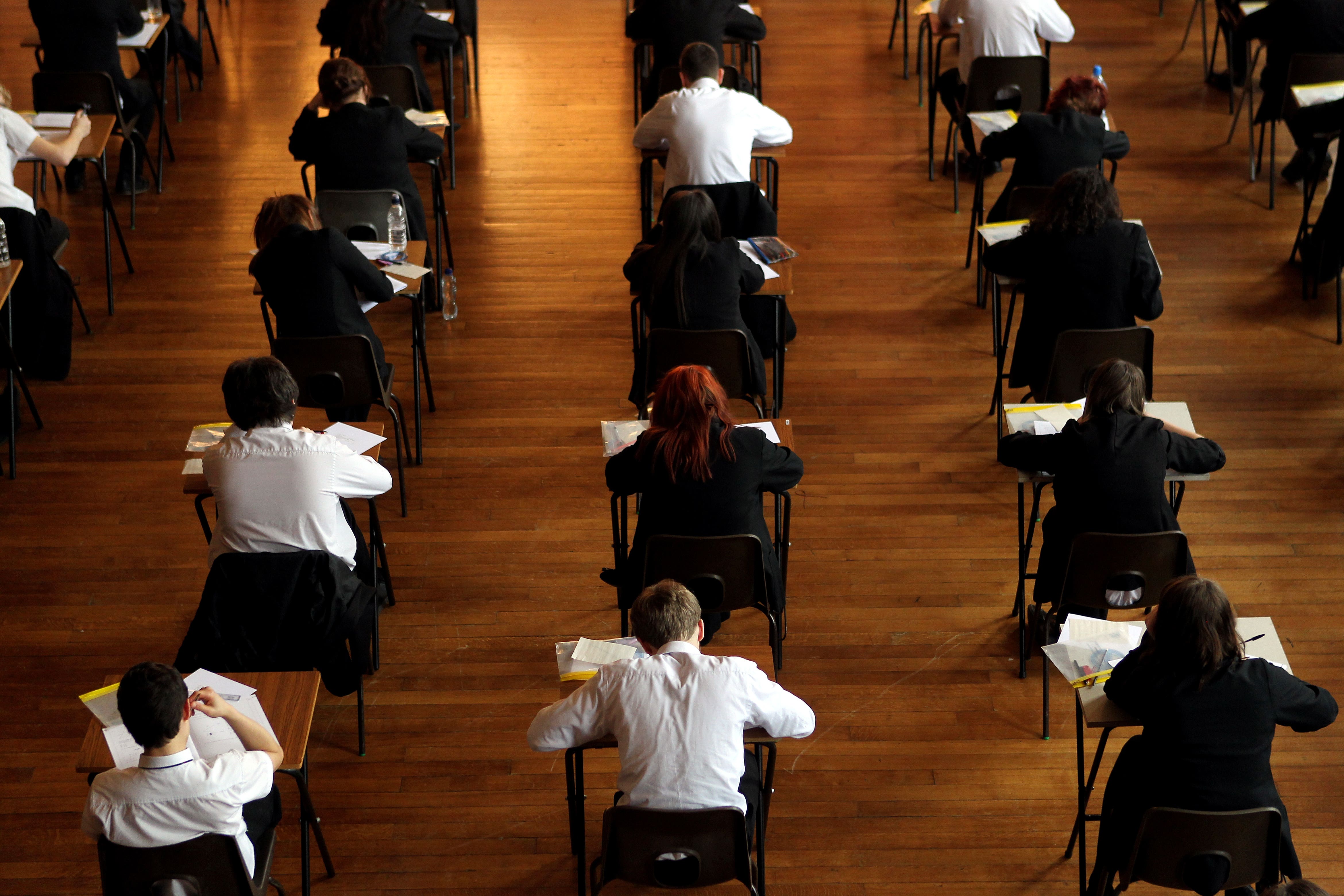 A former PE teacher has been banned from teaching after launching an online petition calling for his headteacher's resignation over alleged racism