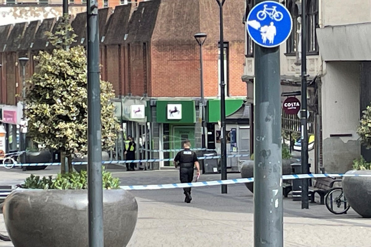 Man charged with murder after fatal stabbing inside bank