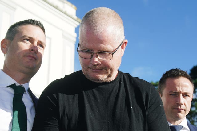 Richard Satchwell (centre) leaving the District Court in Cashel, Co Tipperary (PA)