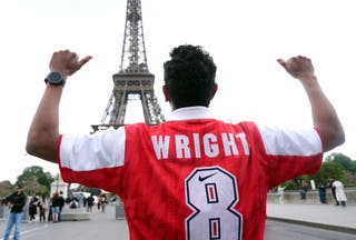A arsenal fan absorbs the views before the start