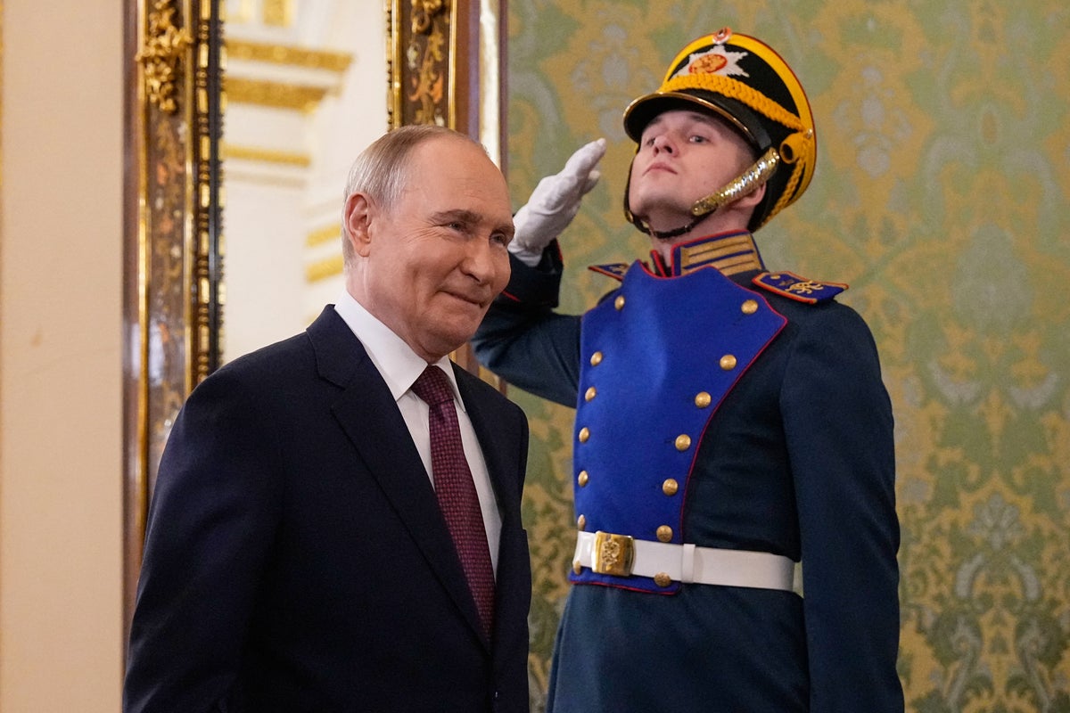 Biden accuses Trump of ‘modern day appeasement’ as Putin prepares for Victory Day parade