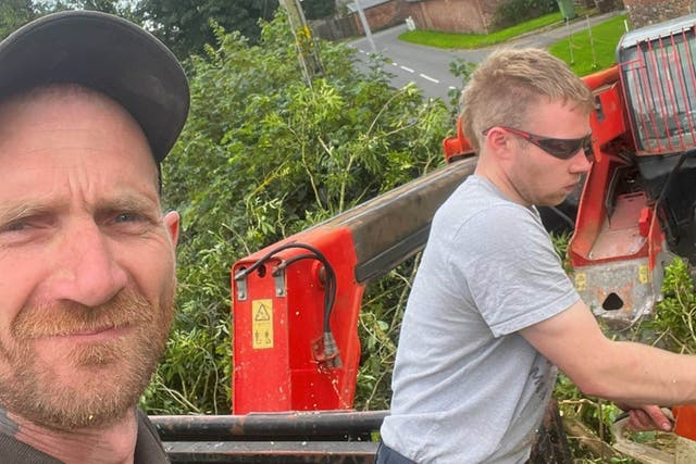 <p>Daniel Graham and Adam Carruthers have both denied they cut down the landmark</p>