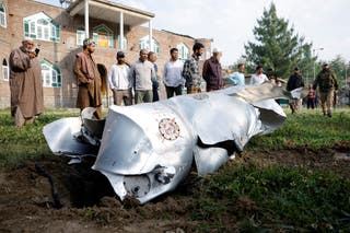 Metal debris lies on the ground in Wuyan