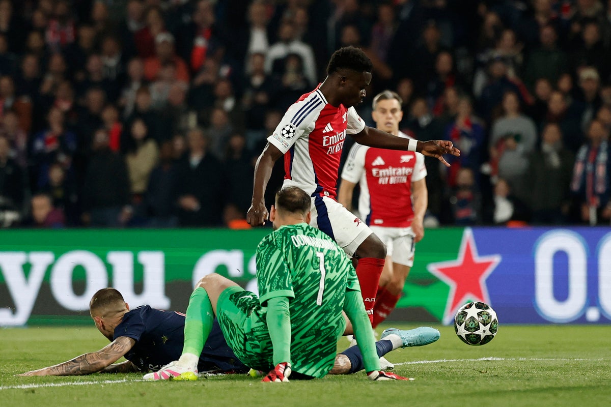 PSG v Arsenal LIVE: Latest updates as Saka goal gives Gunners glimmer of hope of Champions League comeback