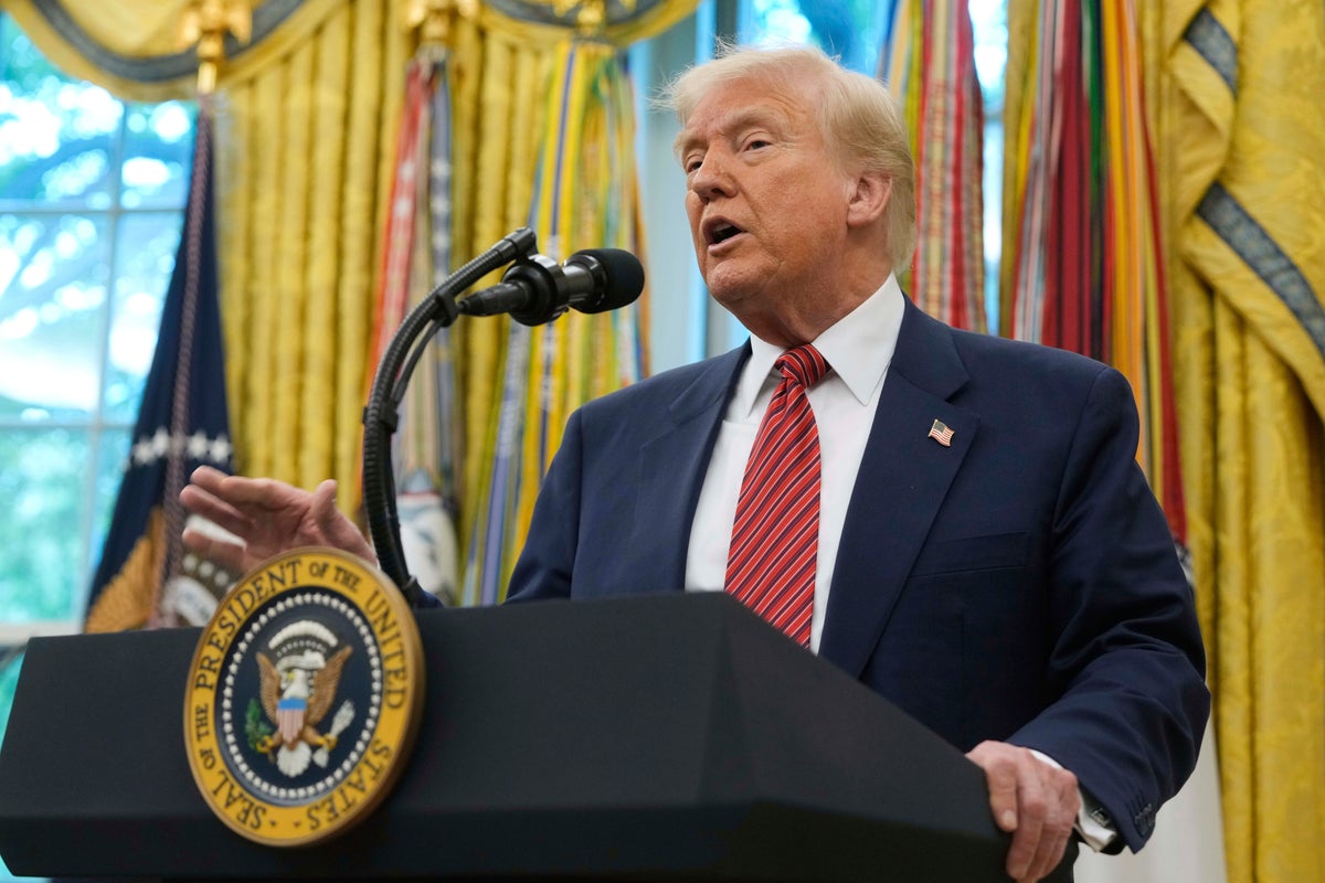 The Latest: UK says trade deal slashes tariffs on cars, steel and aluminum