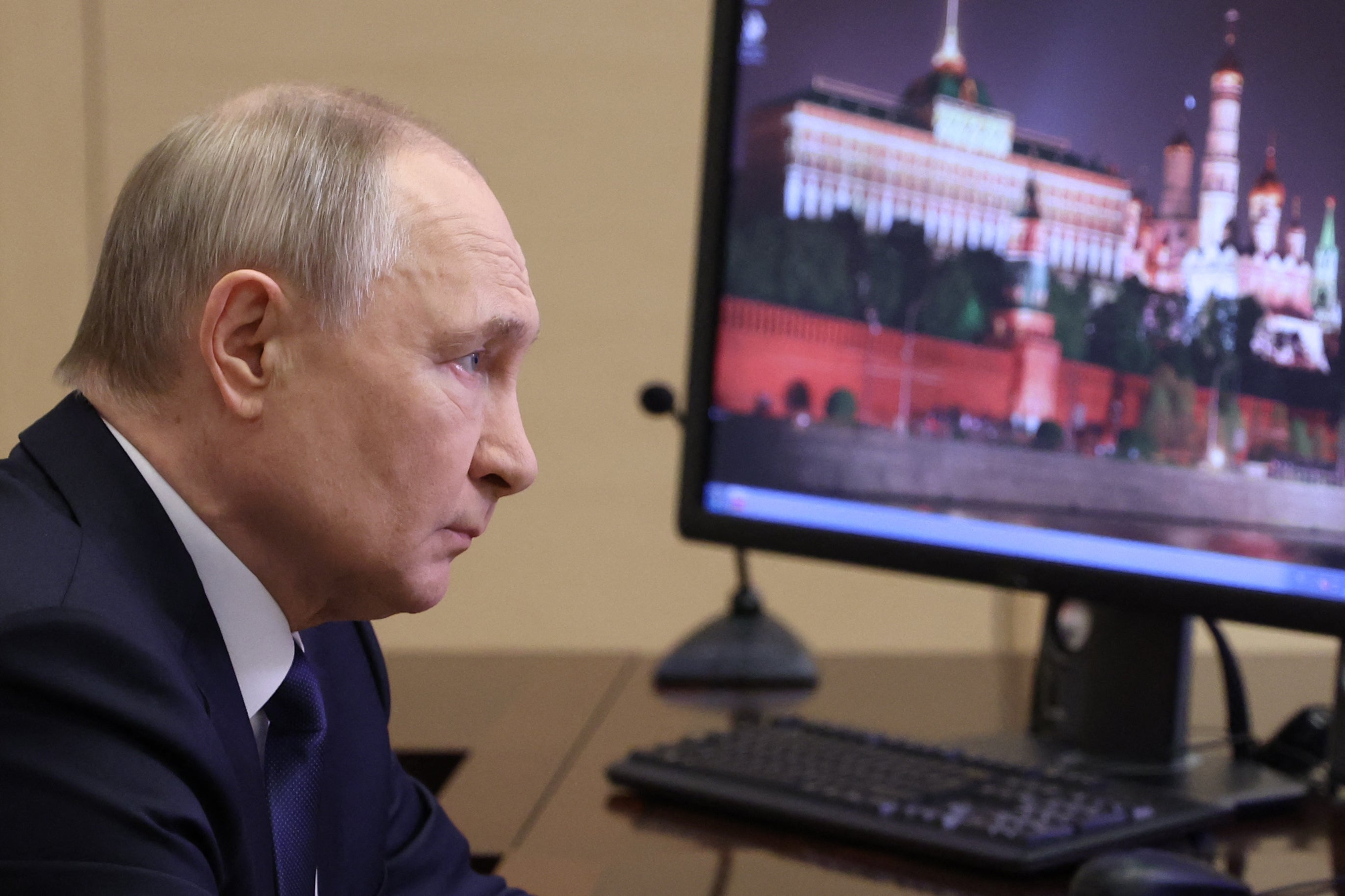 Russia's president Vladimir Putin attends a meeting with Chief of the General Staff of the Russian Armed Forces at the Novo-Ogaryovo state residence outside Moscow