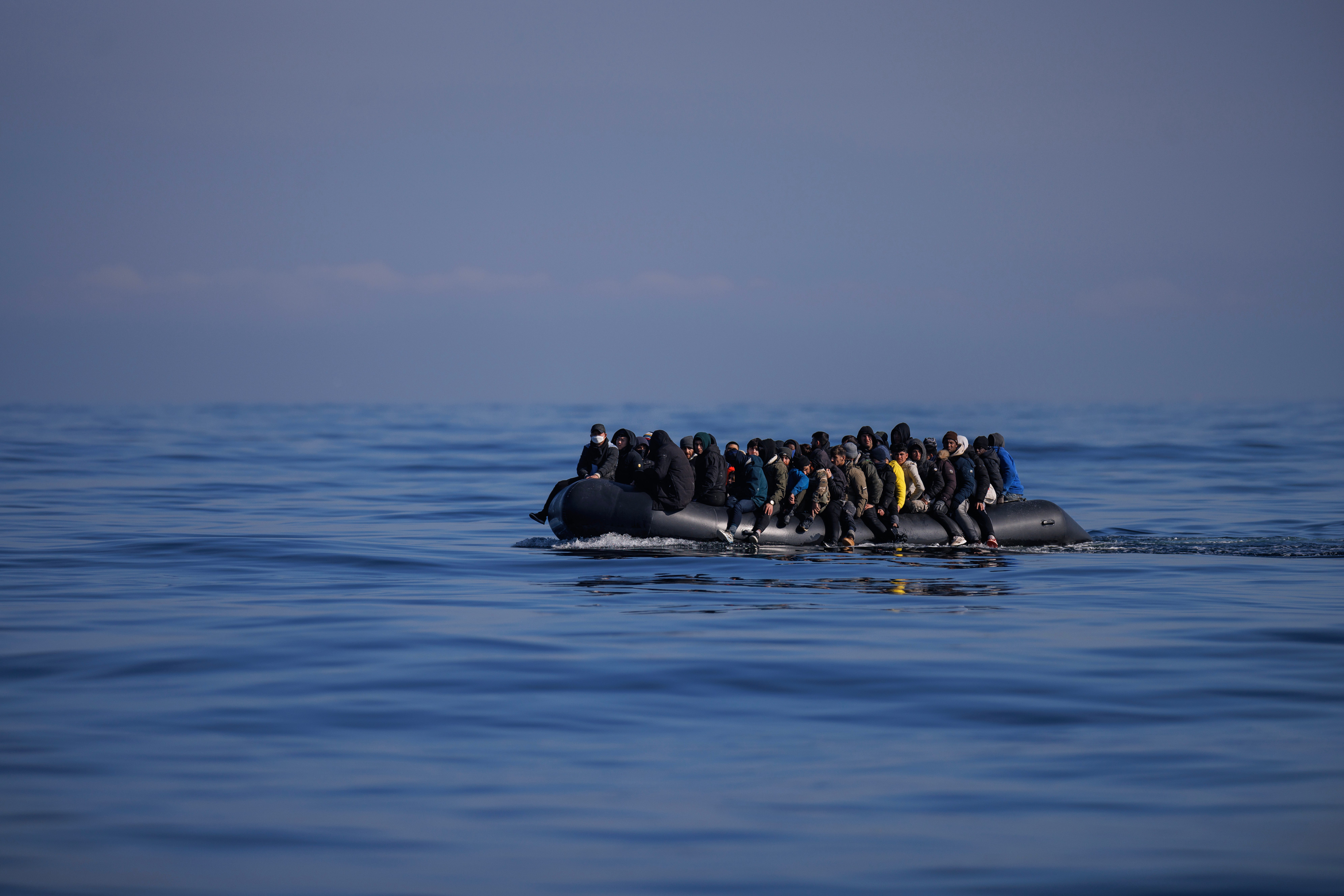 An inflatable dinghy carrying around 65 migrants crosses the English Channel on March 06, 2024 in the English Channel.