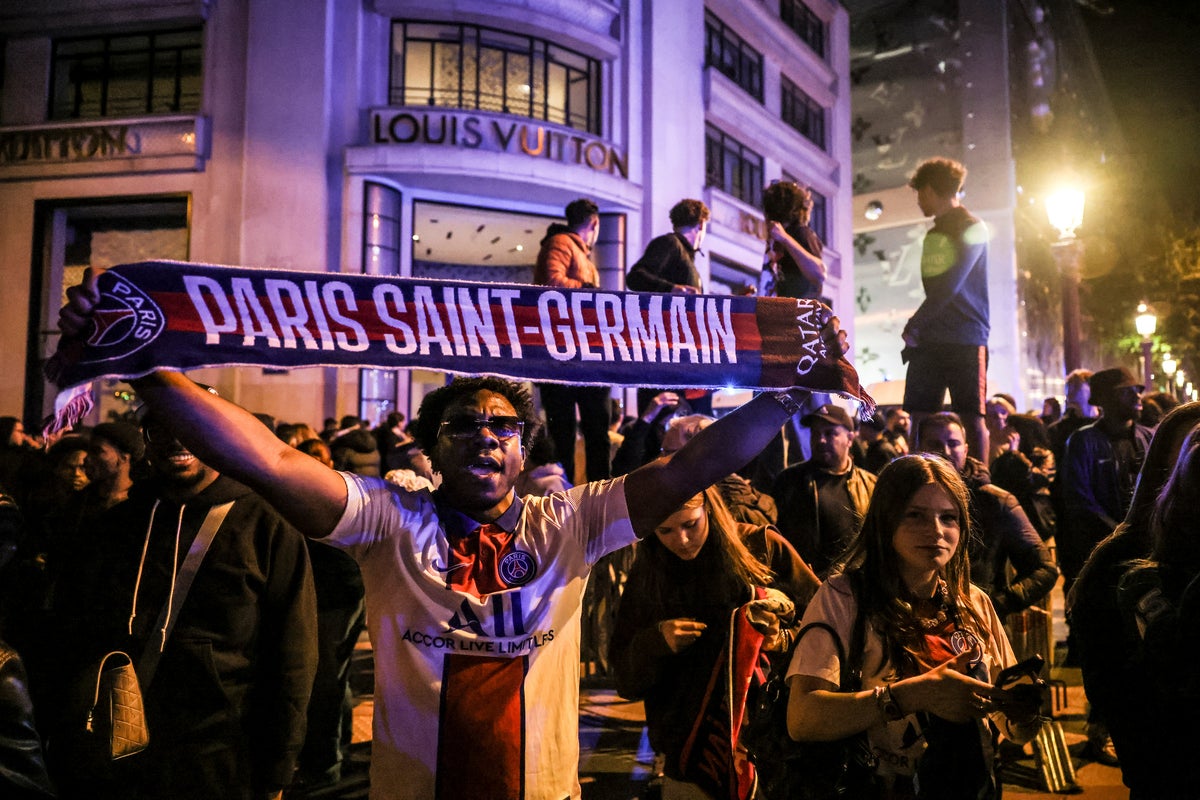 Videos show chaos and fires on the streets of Paris after PSG win over Arsenal