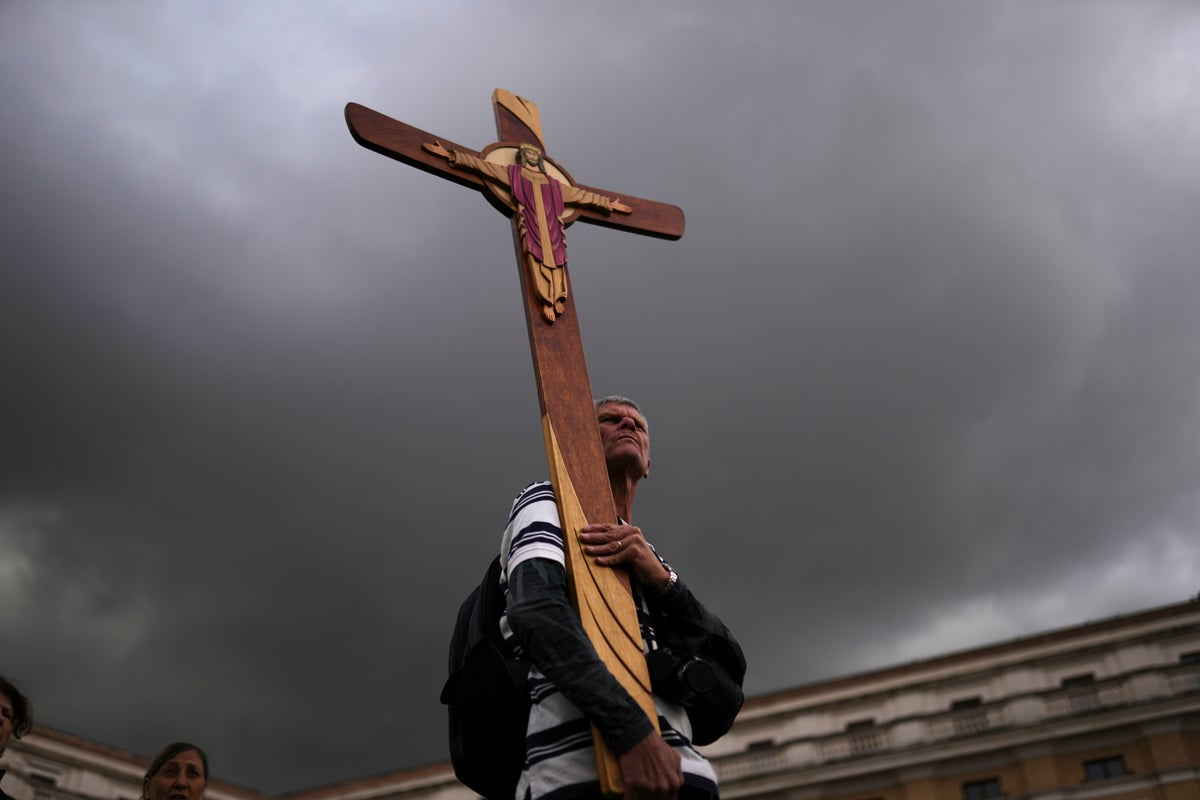AP PHOTOS: Cardinals return to the Sistine Chapel for a second day of voting to elect a new pope