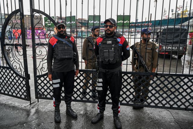 <p>Security personnel guard a street near Rawalpindi cricket stadium after a drone was allegedly shot down in the area on 8 May 2025</p>