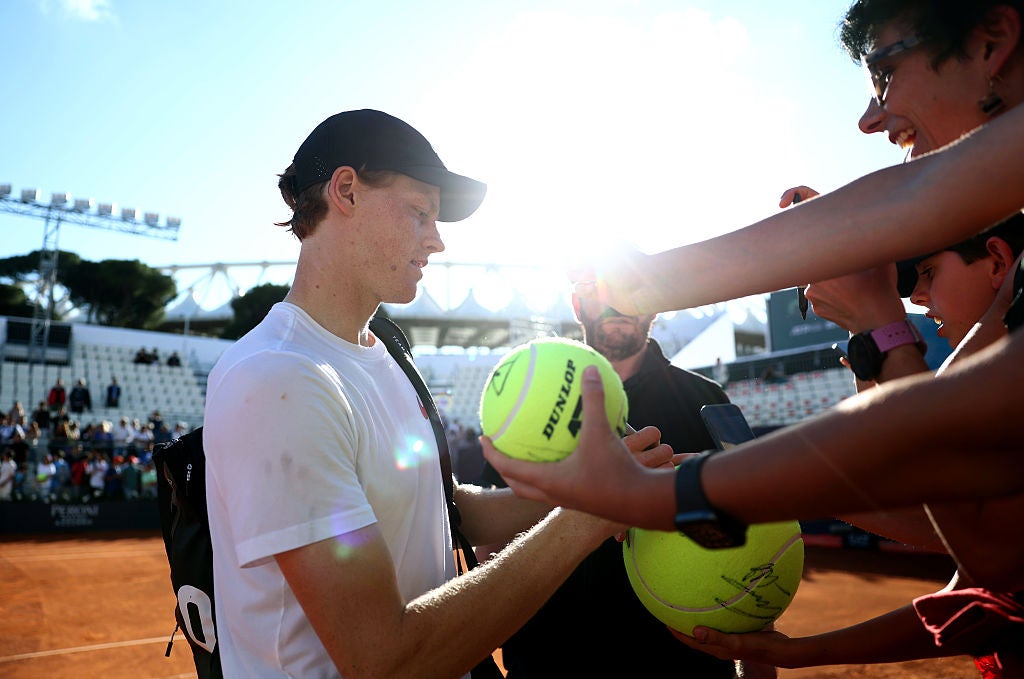 Sinner signs autographs in Rome ahead of his return
