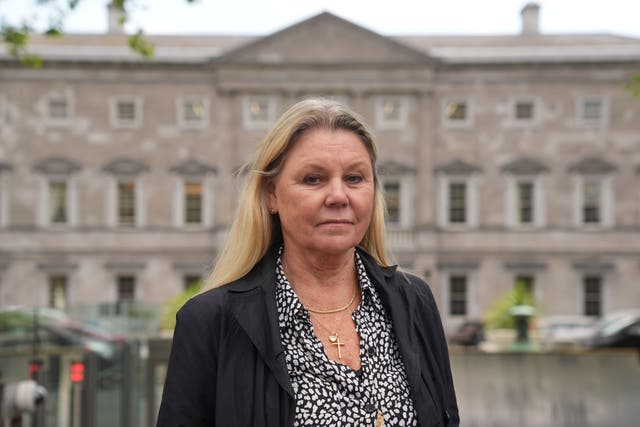 <p>Heather Cornelius, the wife of Ryan Cornelius (Brian Lawless/PA)</p>