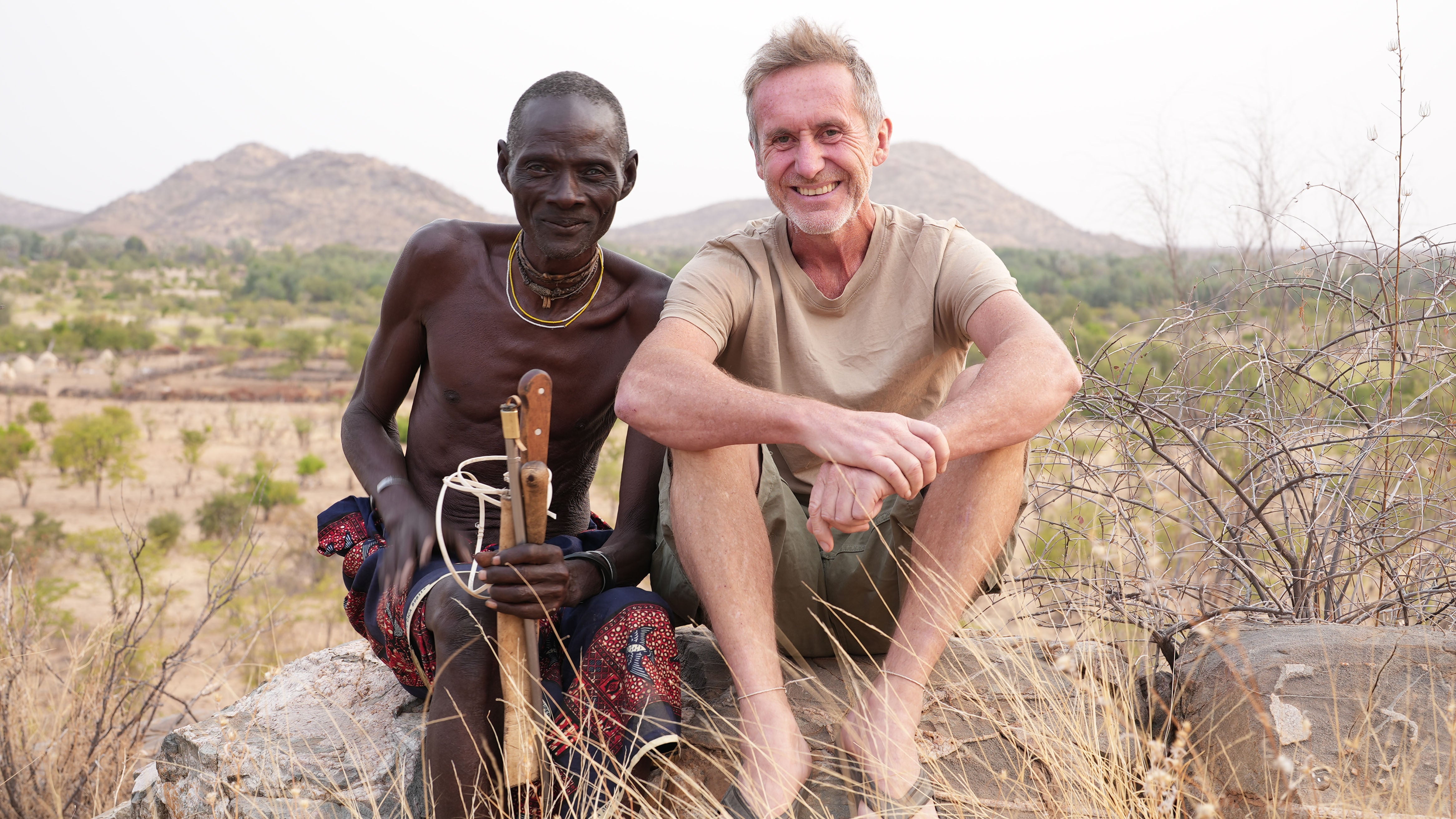 The TV presenter and activist Bruce Parry with Chief Keluie, the Mucubal village leader, in his new series, ‘Tribe with Bruce Parry’