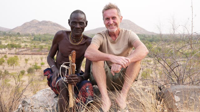 <p>The TV presenter and activist Bruce Parry with Chief Keluie, the Mucubal village leader, in his new series, ‘Tribe with Bruce Parry’</p>
