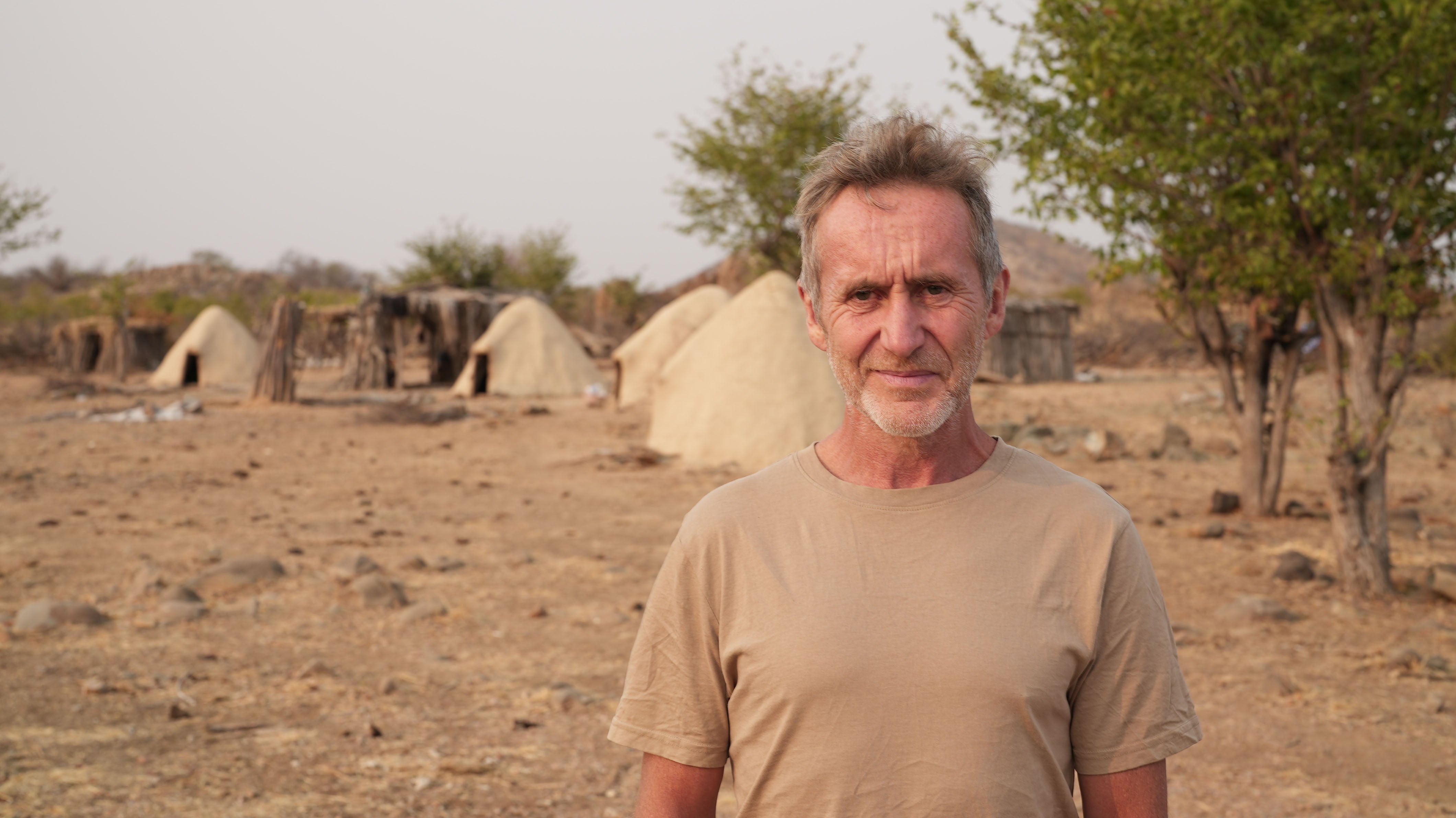 Parry in front of the Mucubal village of Cavalecamue in Angola’s Naimb Desert