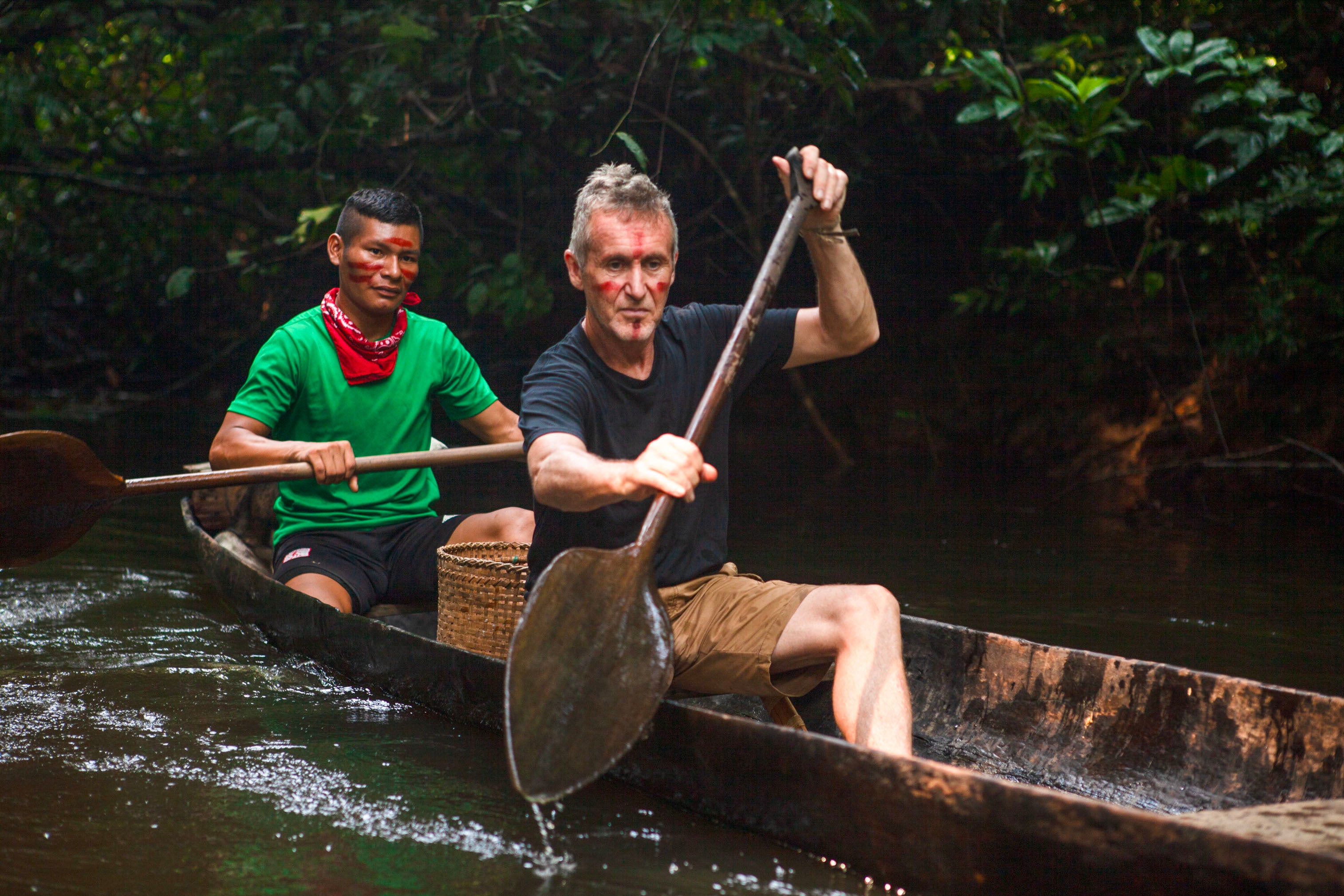 Bruce Parry canoes with a Waimaha man, Ferney, up the river Tiquié in the Colombian Amazon