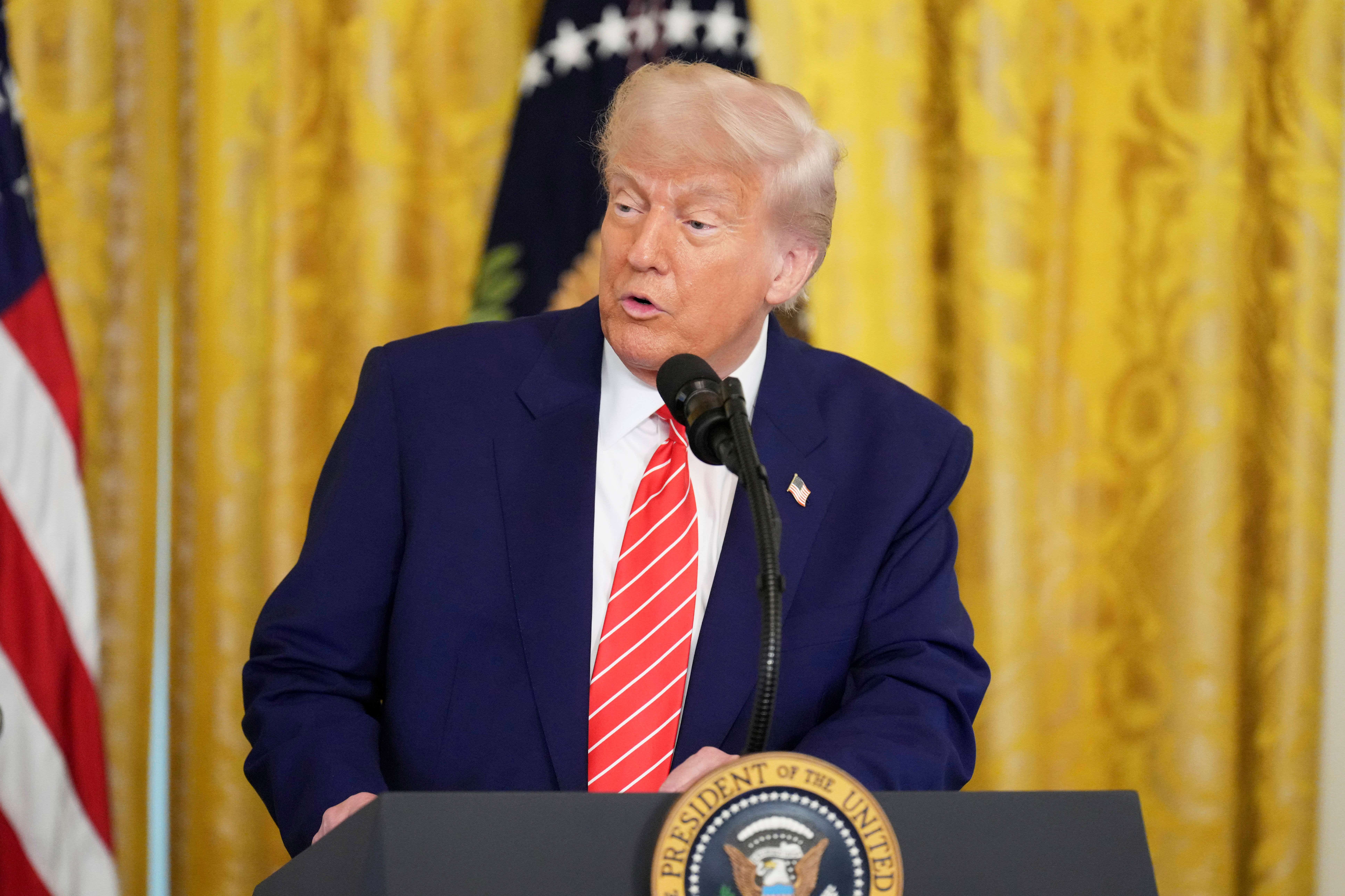 President Donald Trump in the East Room of the White House in Washington (Jacquelyn Martin/AP)