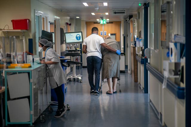 Staff on a hospital ward (PA)