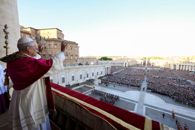 <p>Newly elected Pope Leo XIV waves to faithful and pilgrims gathered in St. Peter's Square shortly after his election</p>