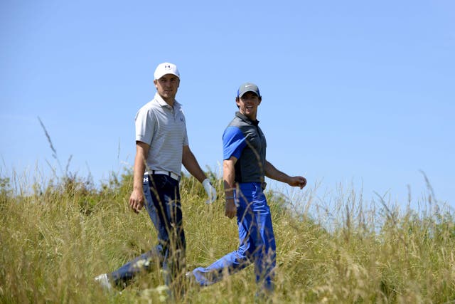 Jordan Spieth, left, can join Rory McIlroy, right, in golf’s most exclusive club by winning the US PGA Championship (Owen Humphreys/PA)