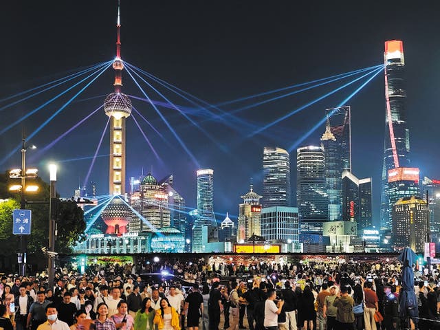 <p>A light show is staged in the Pudong New Area of Shanghai on 17 April</p>