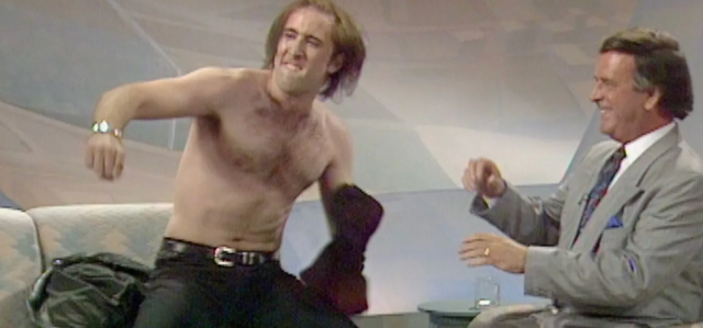 <p>Nicolas Cage on the Wogan show in 1990</p>
