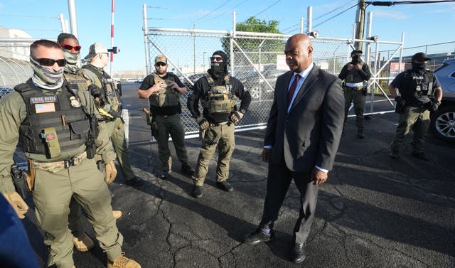 <p>Mayor Ras Baraka of Newark confronts ICE agents at a demonstration outside an immigrant detention center in Elizabeth, on May 7</p>