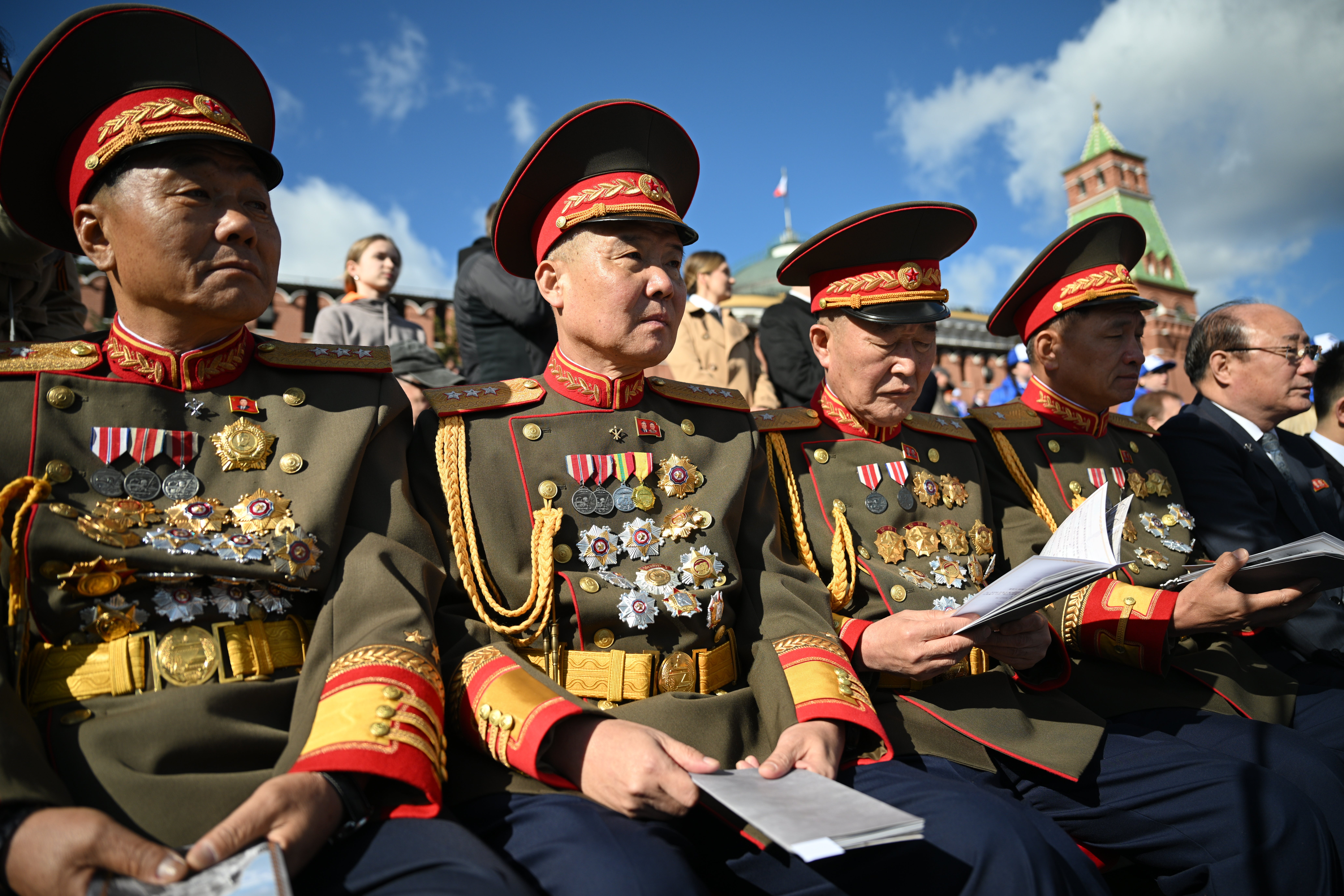 North Korean officers sit for Putin’s Victory Day Parade in Moscow