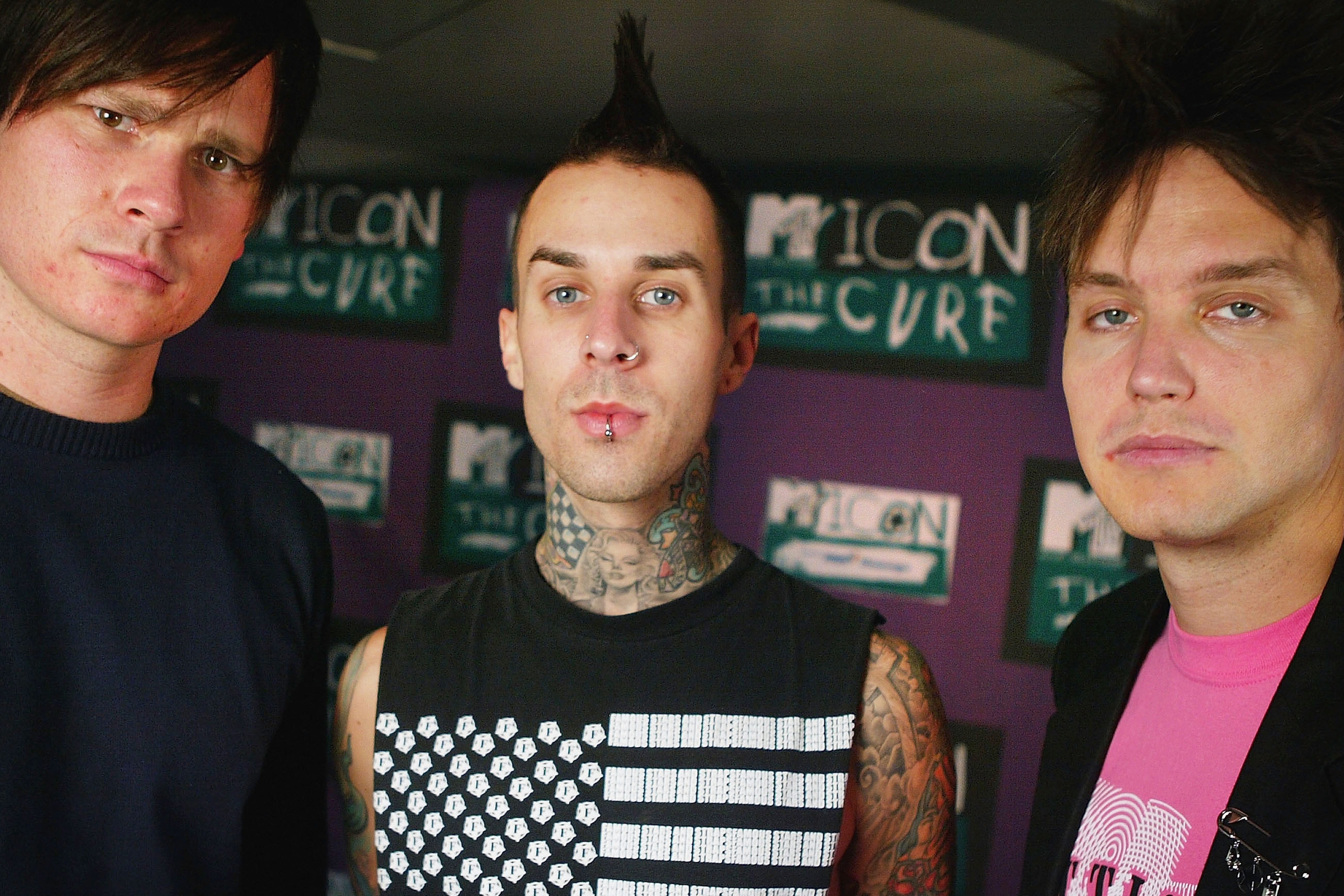 Three musketeers: Tom DeLonge, Travis Barker, and Mark Hoppus of pop-punk band Blink-182 in 2004
