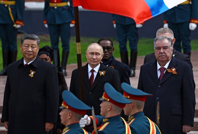 <p>Chinese president Xi Jinping and Russian leader Vladimir Putin in Moscow</p>