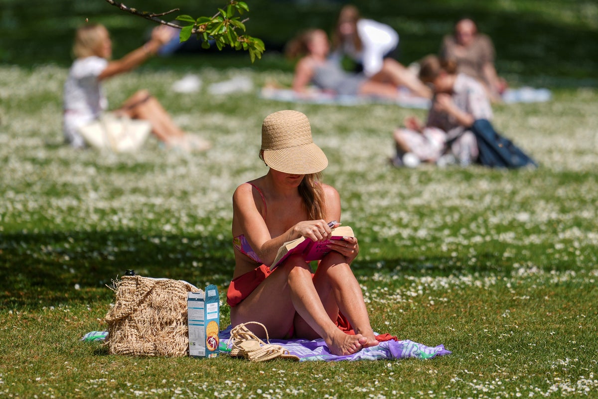 Temperatures soar across the UK – but thunder and lightning may be on the way