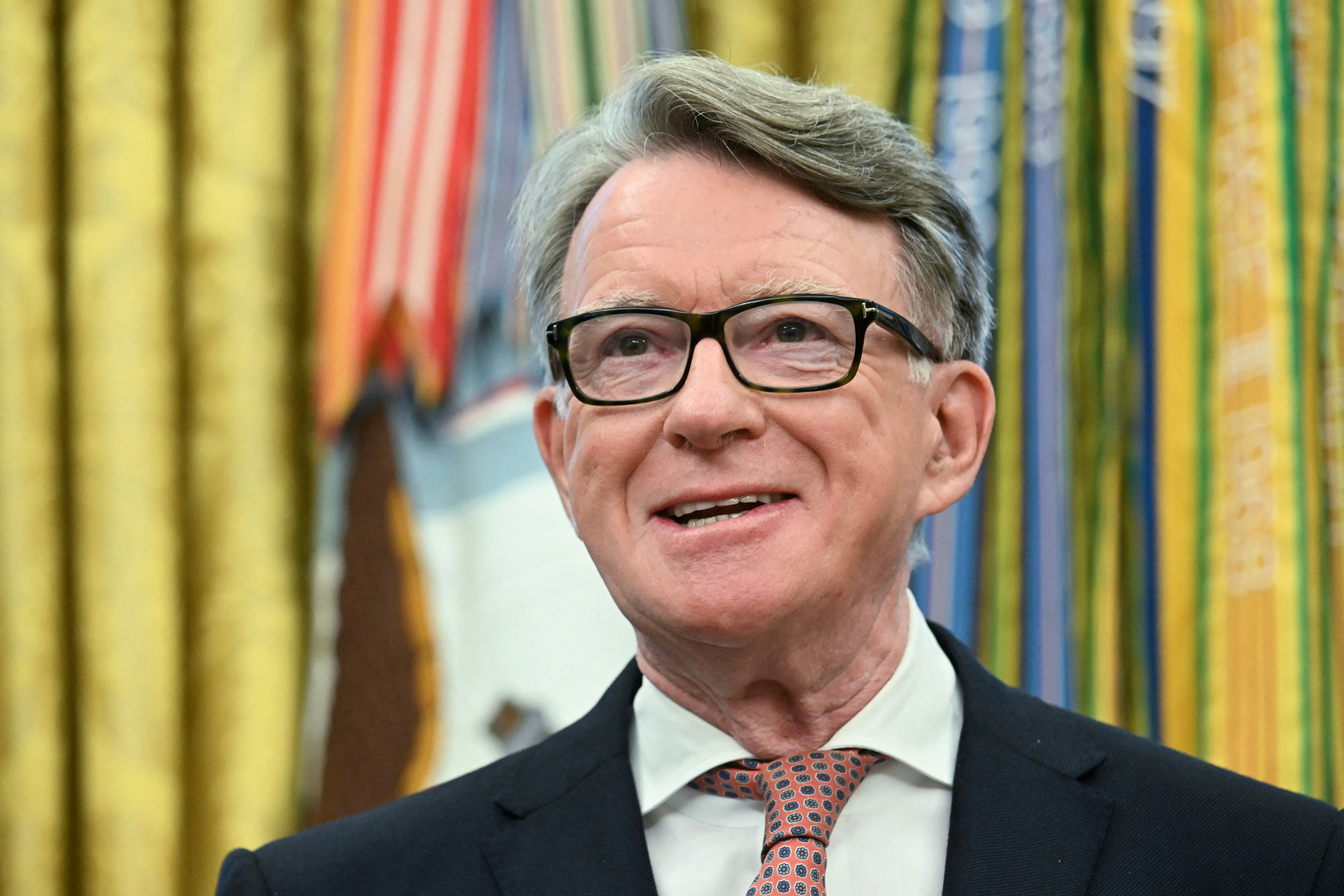 Lord Mandelson stood beside Donald Trump as he announced the trade deal with Britain