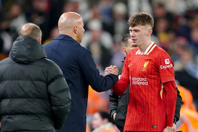 Arne Slot (left) is keen to avoid comparing Liverpool’s Conor Bradley (right) to tret Alexander-Arnold (Peter Byrne/PA)