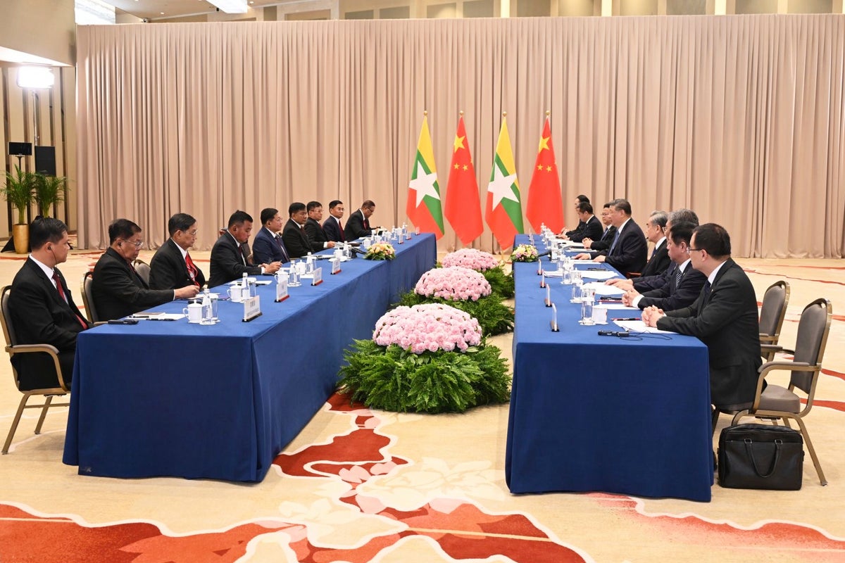 Myammar's military government chief has first meeting with China's leader since taking power in 2021