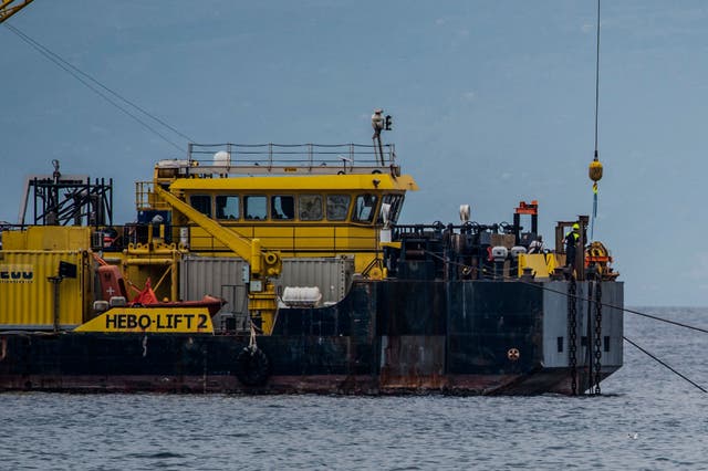 <p>The multi-purpose floating work barge Hebo Lift 2 monitors the stretch of sea off Porticello, near Palermo, Sicily, Italy, Sunday, May 4, 2025, where the British superyacht Bayesian sunk on August 19, 2024 as the operations for its recovery start. (AP Photo/Salvatore Cavalli)</p>