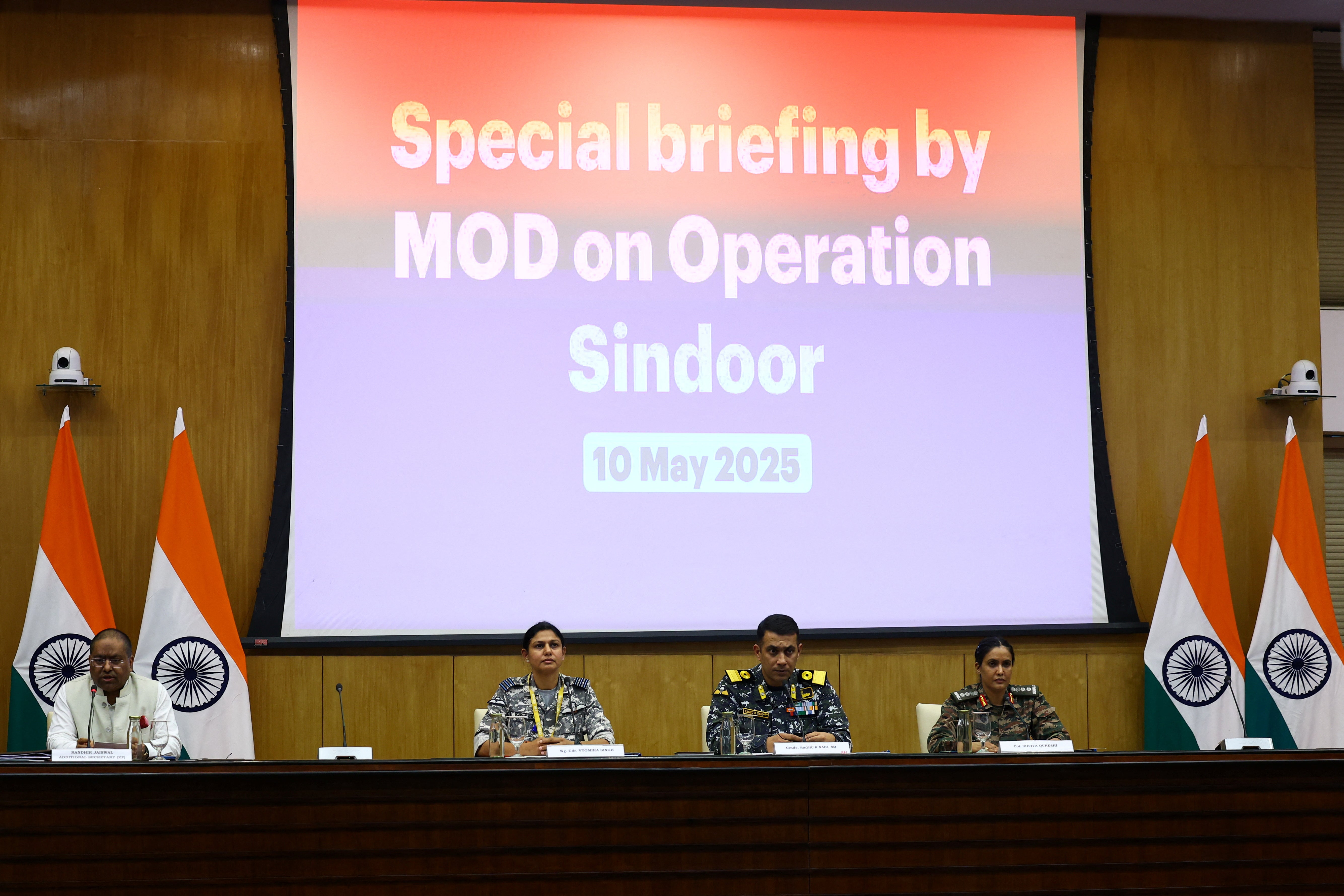 Commodore R Raghu Nair, Colonel Sophia Qureshi, Wing Commander Vyomika Singh and Additional Secretary Randhir Jaiswal attend a press briefing