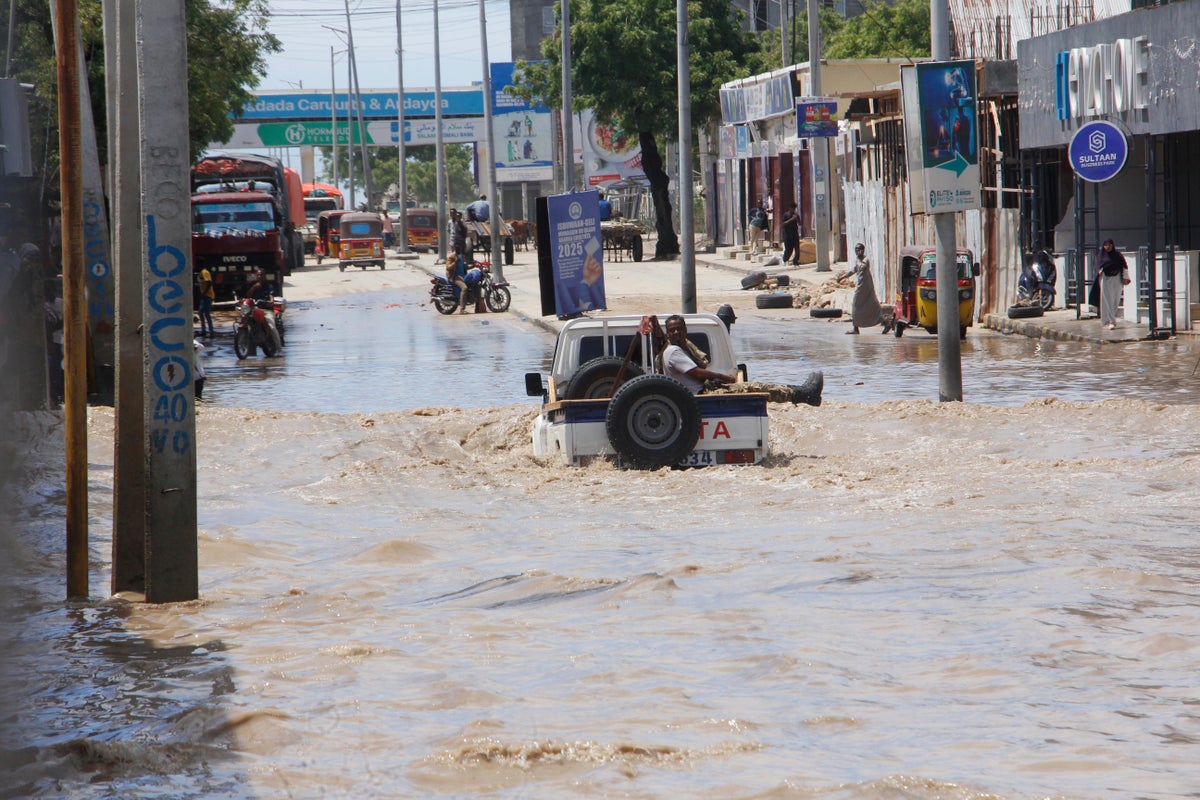 At least seven people die as heavy rains leave waist-high floodwaters in Somalia's capital