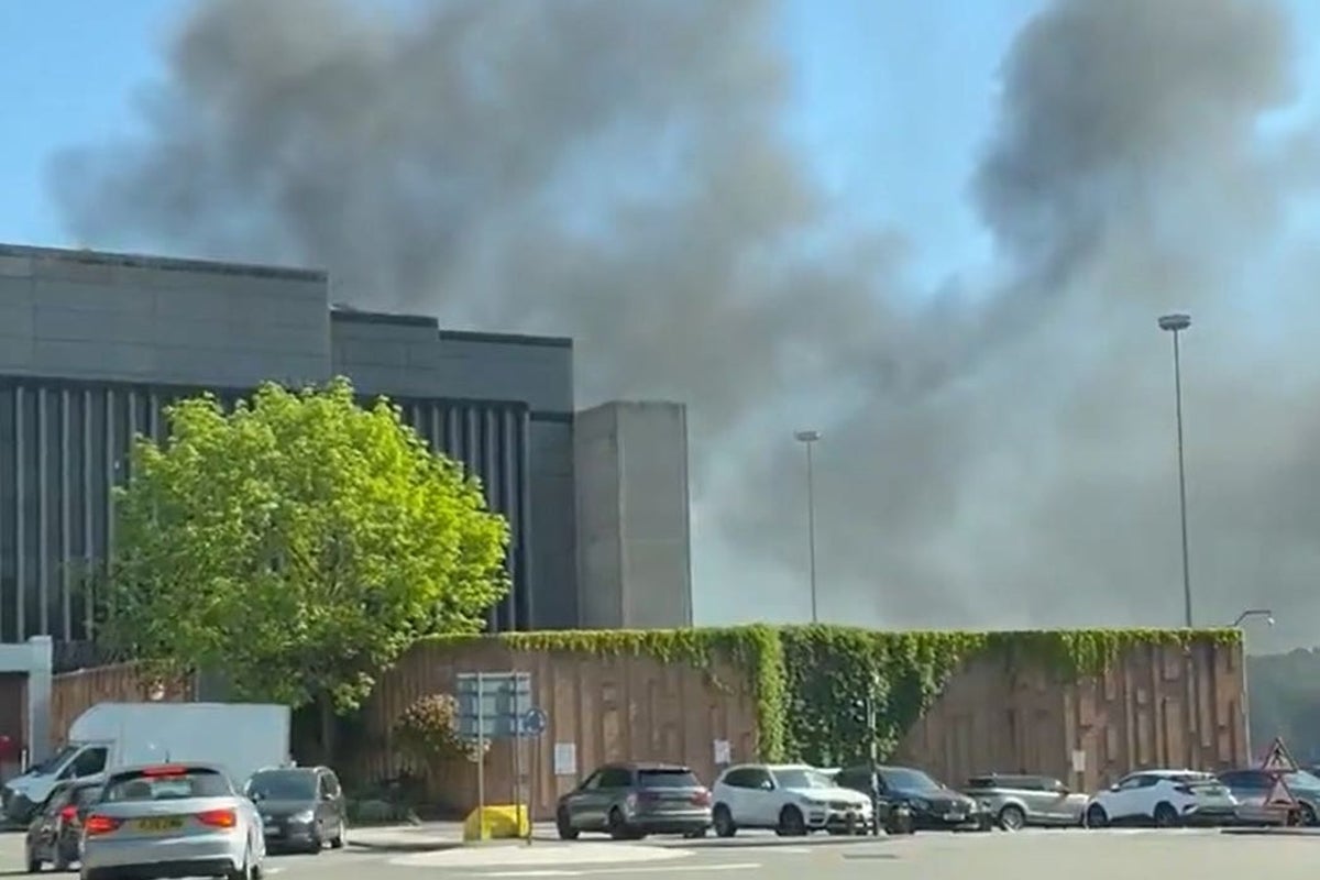 Cars catch fire at London shopping centre