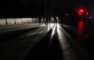 Pakistani security officials secure the Noor Khan Airbase following Indian missile strikes in Rawalpindi, Pakistan, 10 May 2025