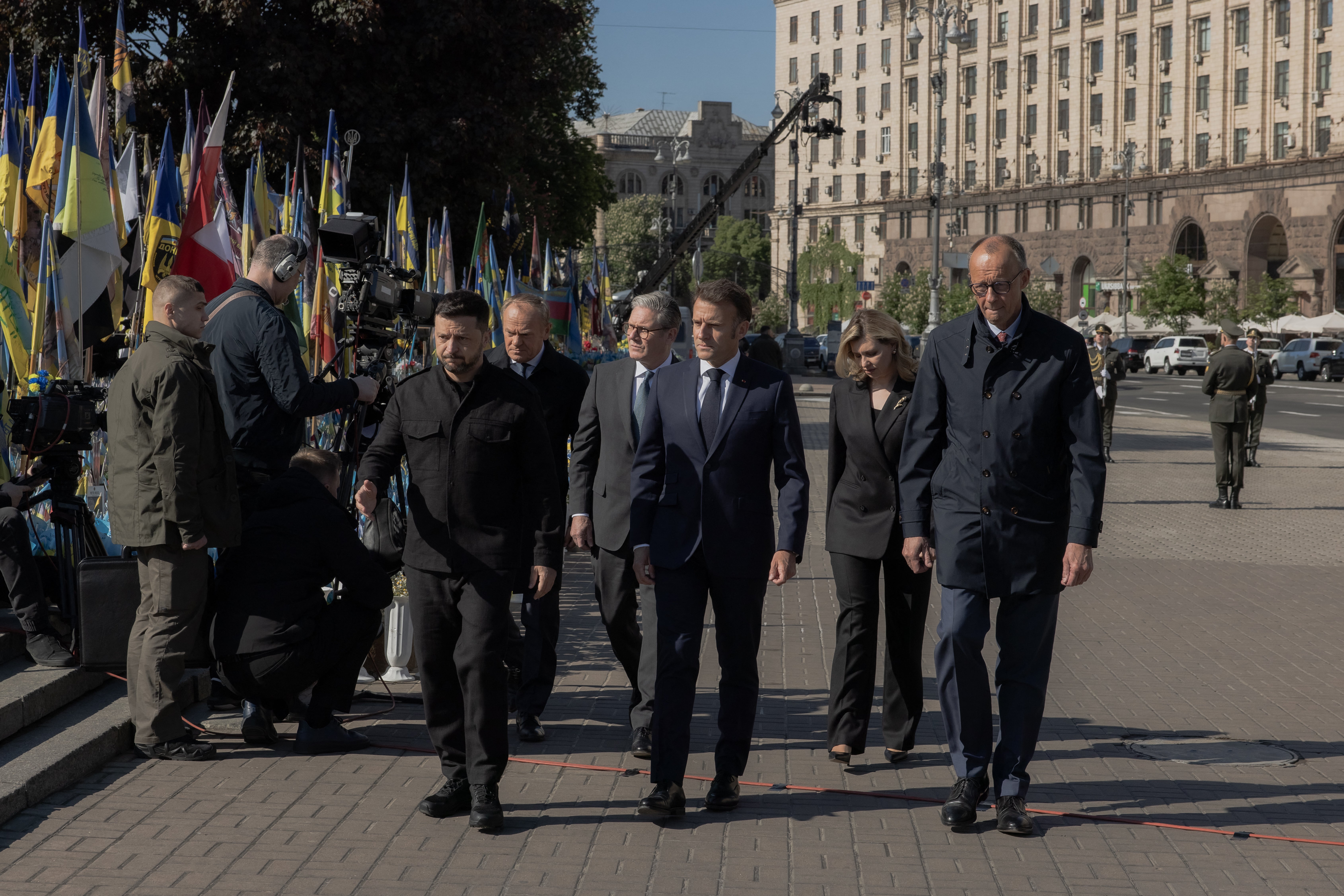 (From L) Ukraine's President Volodymyr Zelensky, Poland's Prime Minister Donald Tusk, Britain's Prime Minister Keir Starmer, France's President Emmanuel Macron, Olena Zelenska and Germany's Chancellor Friedrich Merz