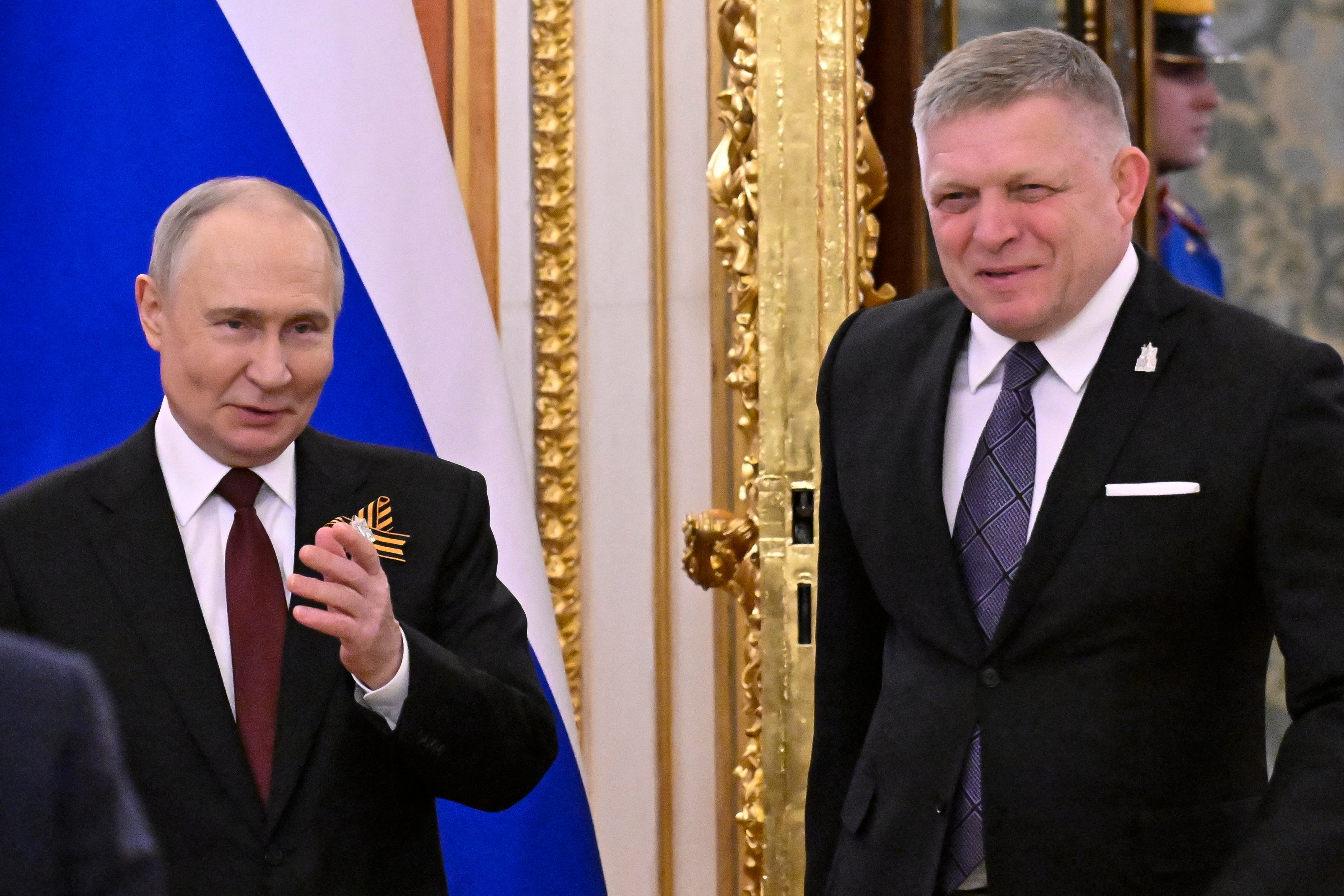 Russian President Vladimir Putin meets with Slovak Prime Minister Robert Fico at the Kremlin in Moscow on May 9, 2025.