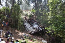 At least 21 passengers killed after bus skids off cliff in Sri Lanka