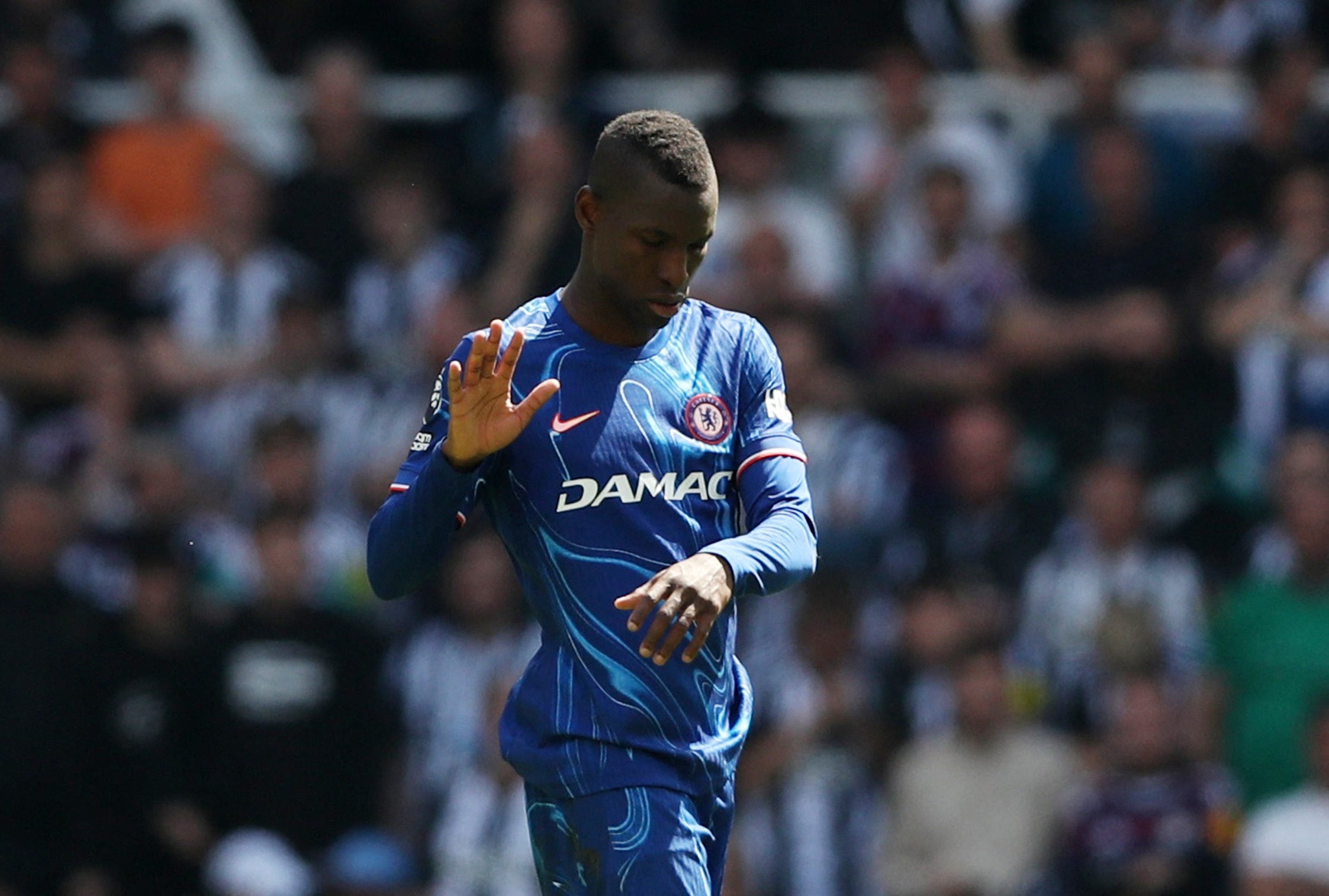 Nicolas Jackson holds up his hand after he was sent off against Newcastle